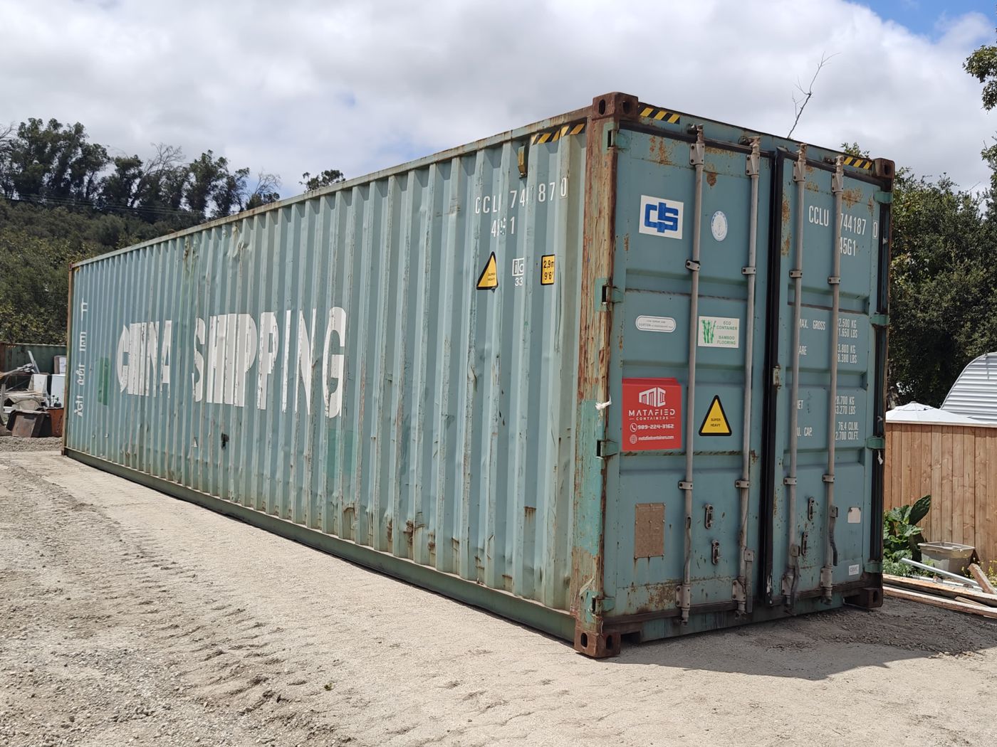 A used container sold under the WWT grade label, showing significant wear and corrosion